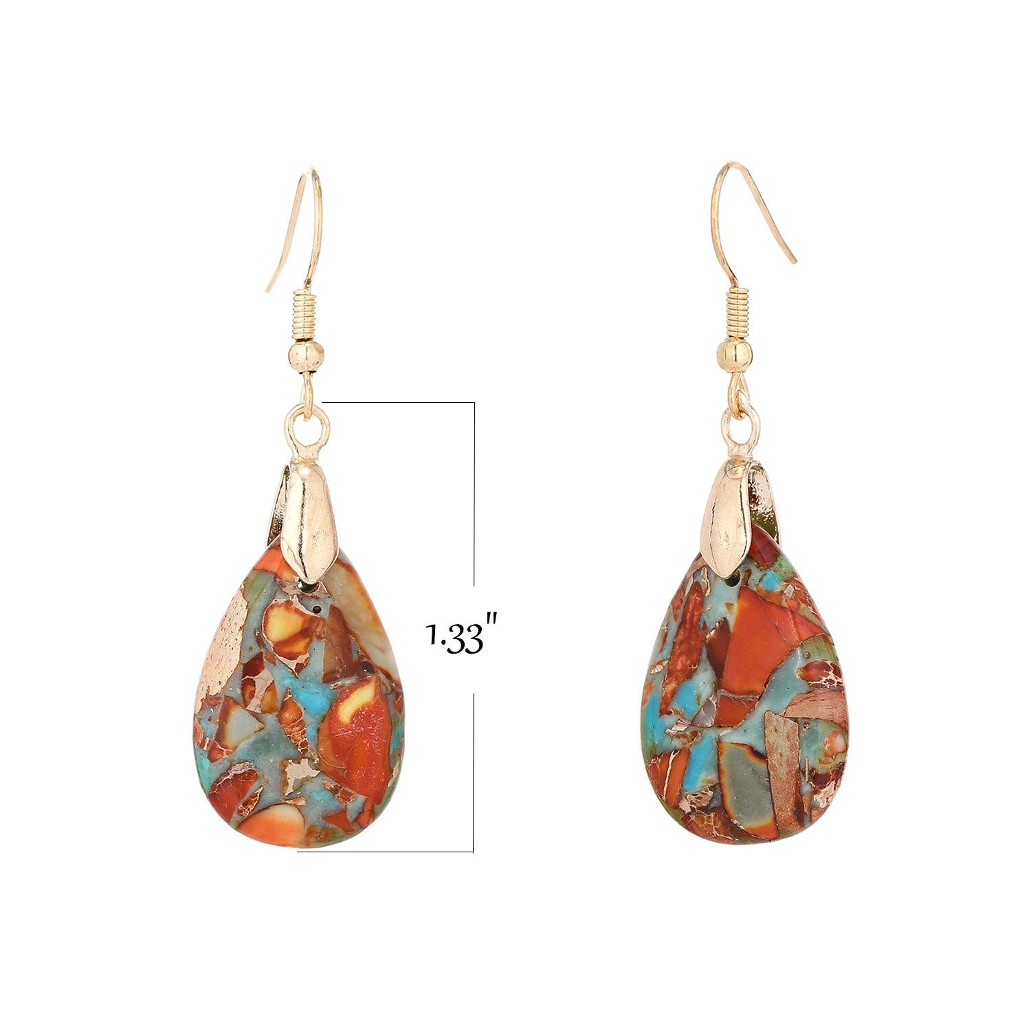 Elegant luxury women's earrings made of natural stones in the shape of a tear with an eye-catching design