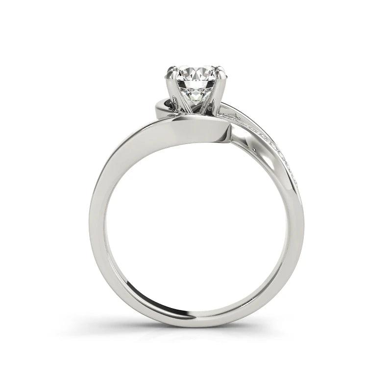 Simple elegant 4 claw ring in 925 sterling silver with 1 carat round cut diamonds and moissanite