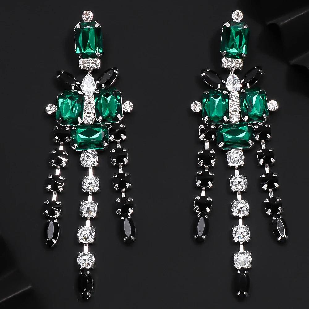 Luxurious set of eye-catching cross necklace and earrings for weddings or engagements with a distinctive green design made of rhinestones