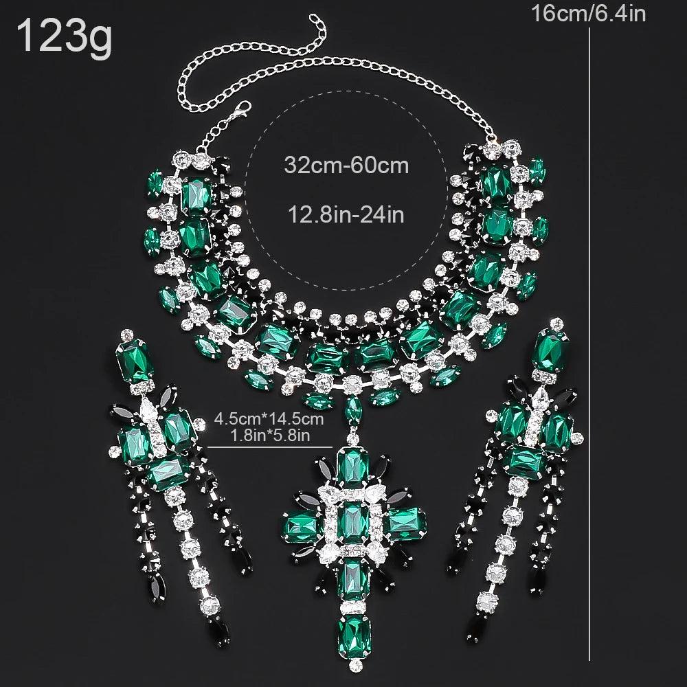 Luxurious set of eye-catching cross necklace and earrings for weddings or engagements with a distinctive green design made of rhinestones