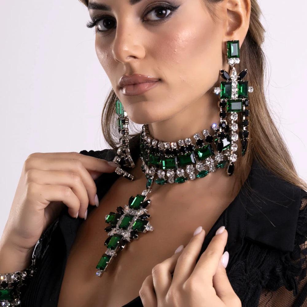 Luxurious set of eye-catching cross necklace and earrings for weddings or engagements with a distinctive green design made of rhinestones