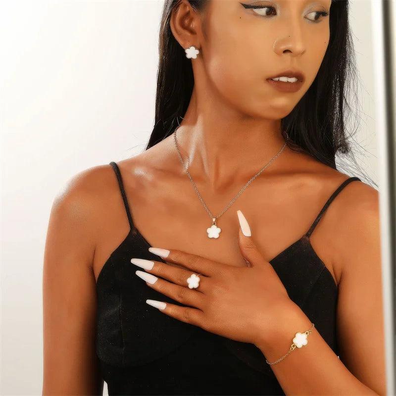 5pcs Women's Jewelry Set featuring Five Leaf Clover Bracelets, trendy French niche necklaces, stylish bracelets, rings, and earrings. This fashionable and versatile collection is perfect for various occasions.