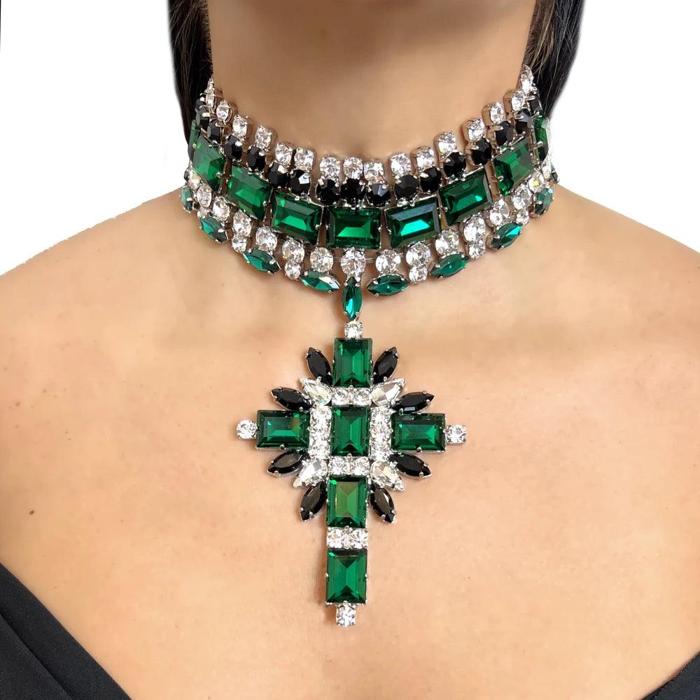 Luxurious set of eye-catching cross necklace and earrings for weddings or engagements with a distinctive green design made of rhinestones